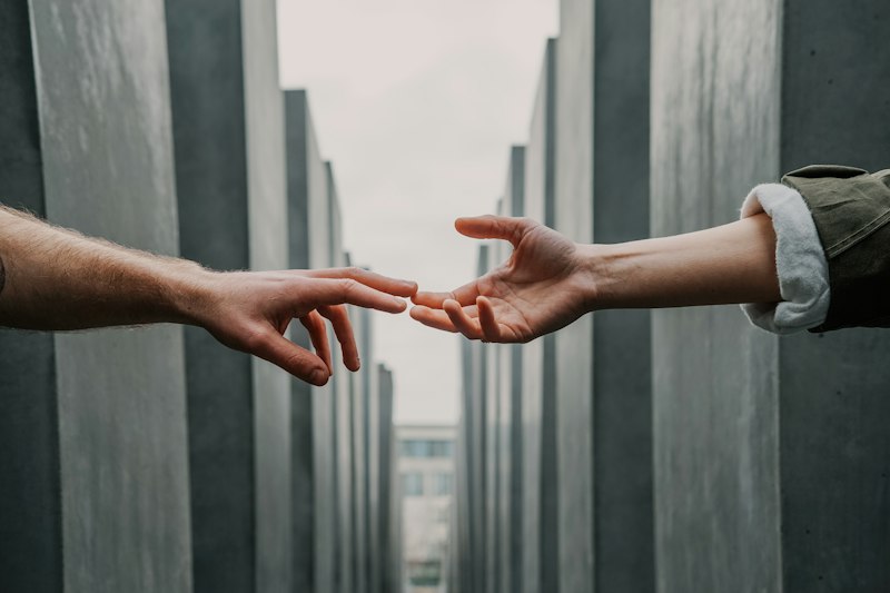 Two women hugging support